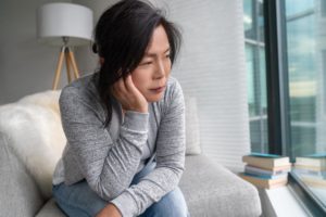 Woman wondering if depression and addiction are related