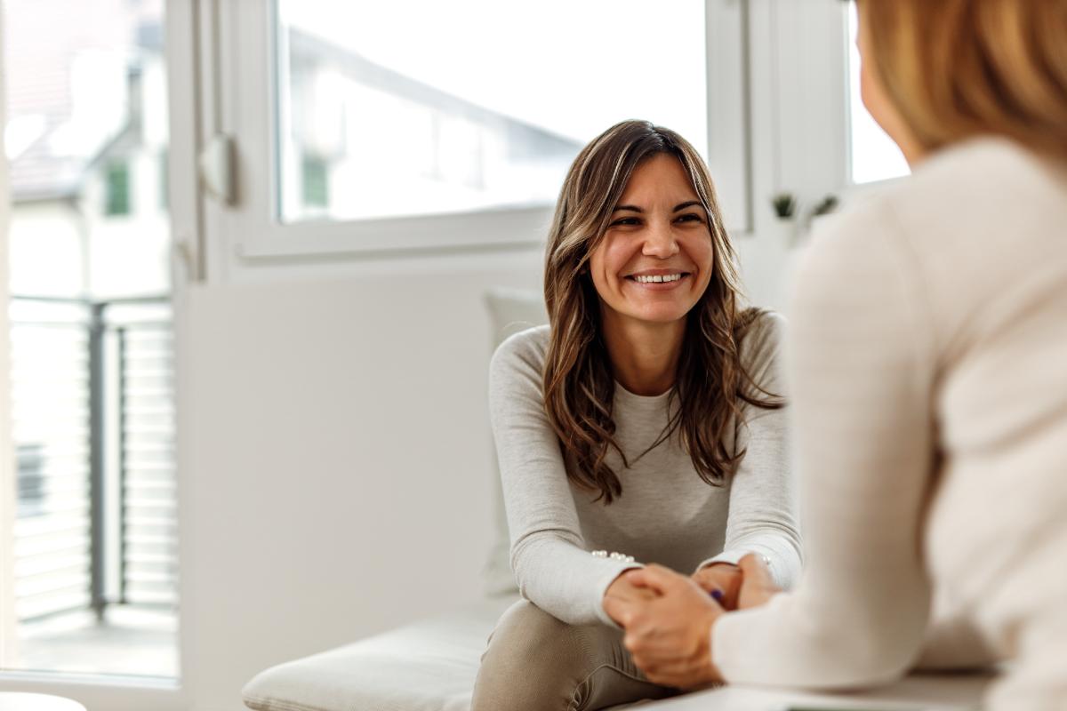 a therapist explains the benefits of residential treatment to a patient