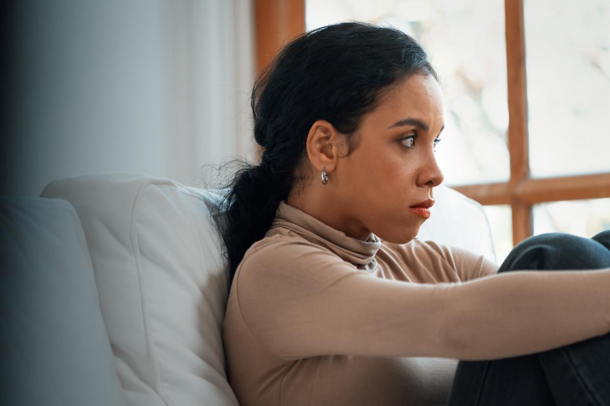 a young woman struggles with symptoms of depression